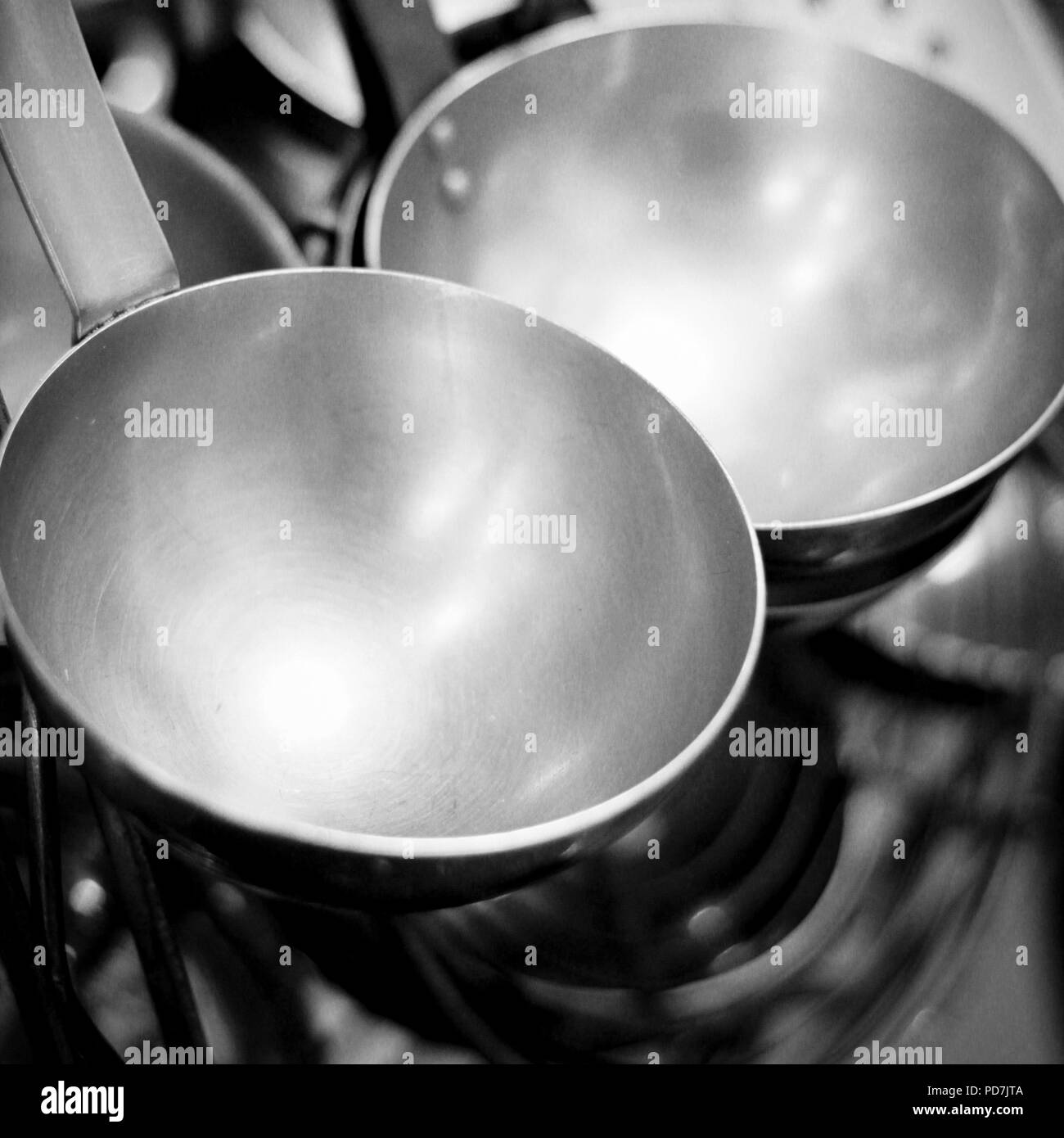 hanging kitchen utensils Stock Photo