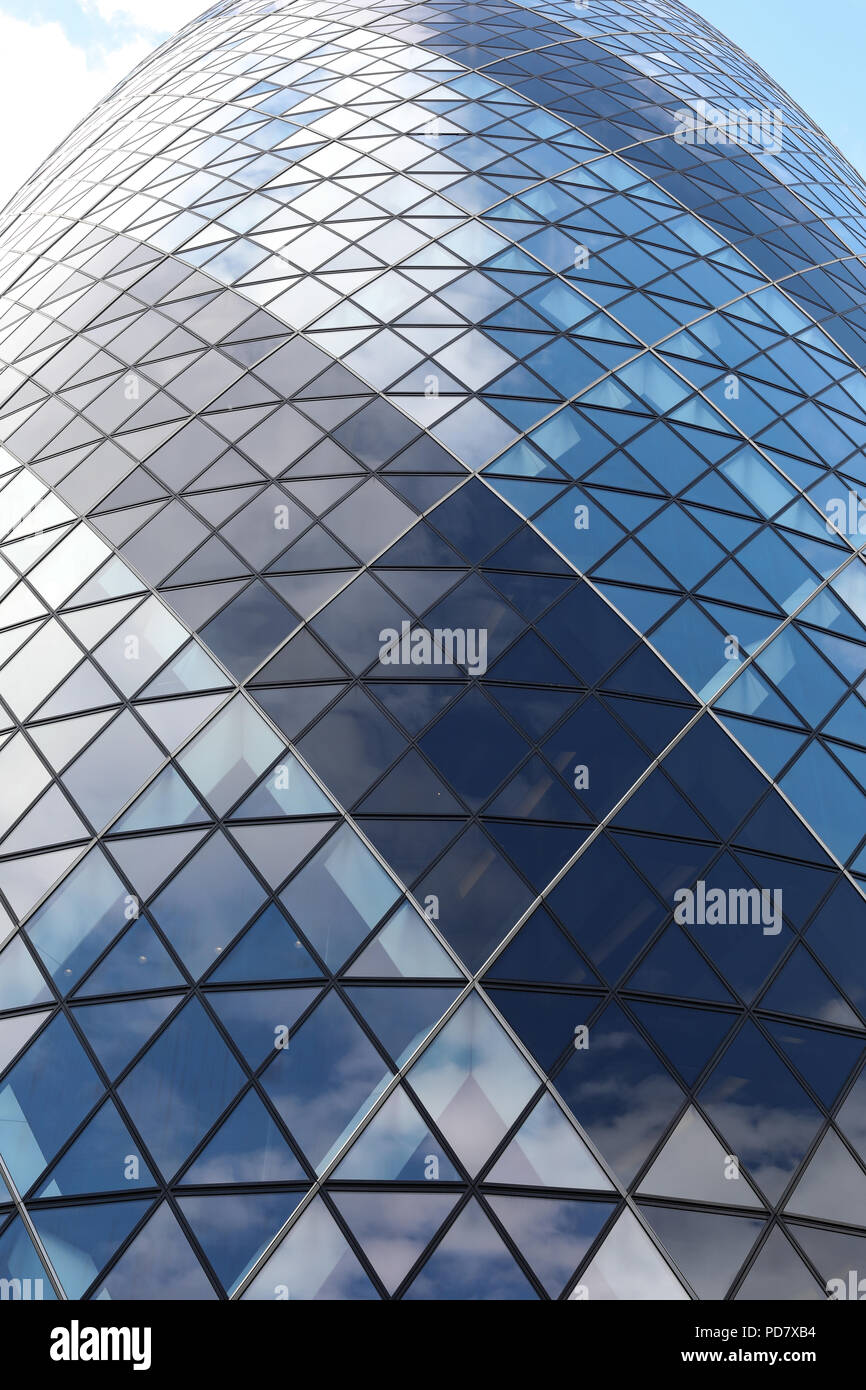A view of 30 St Mary Axe, also known as The Gherkin, in the City of London,UK Stock Photo