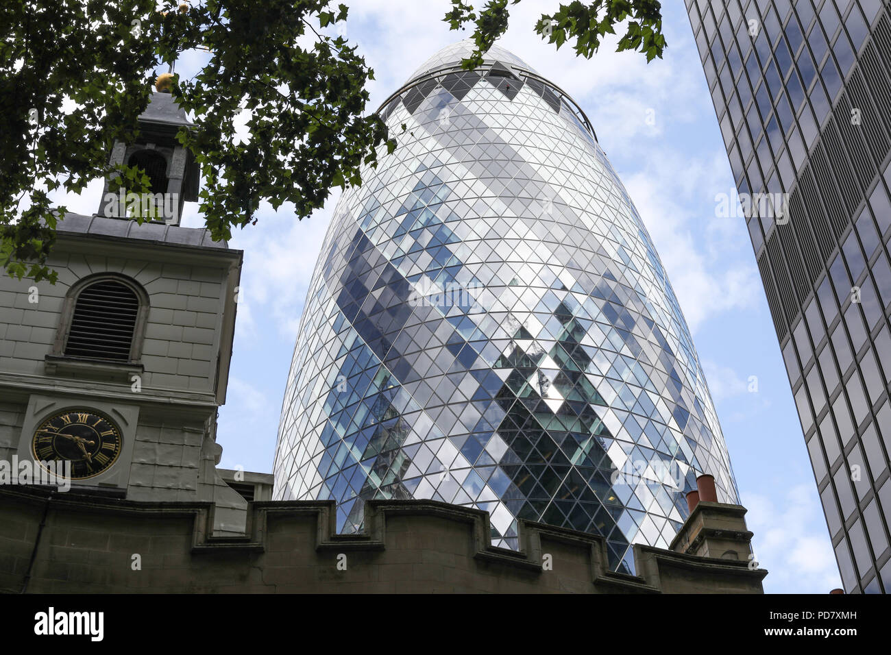 A view of 30 St Mary Axe, also known as The Gherkin, in the City of London,UK Stock Photo
