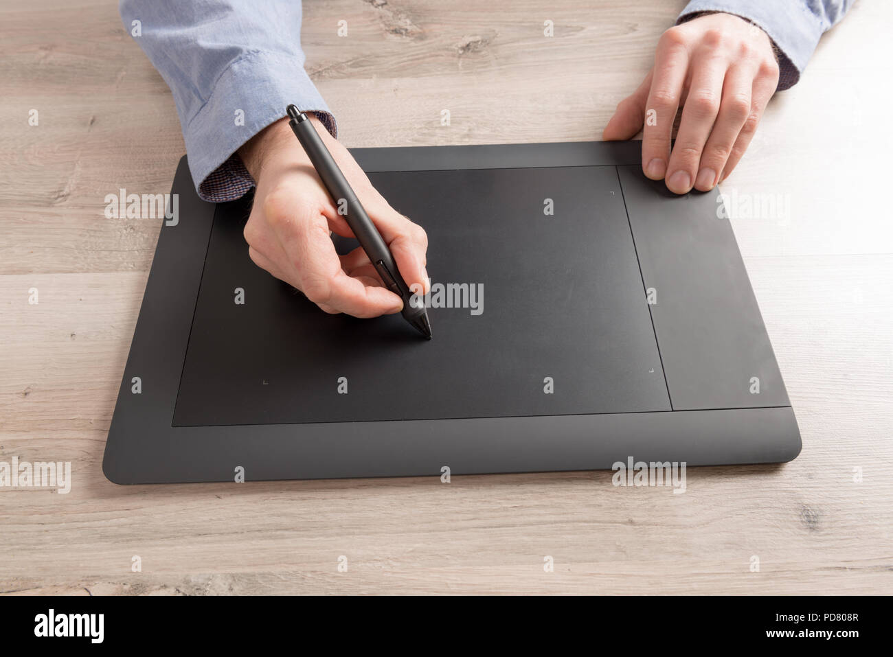 Man using modern graphical tablet Stock Photo