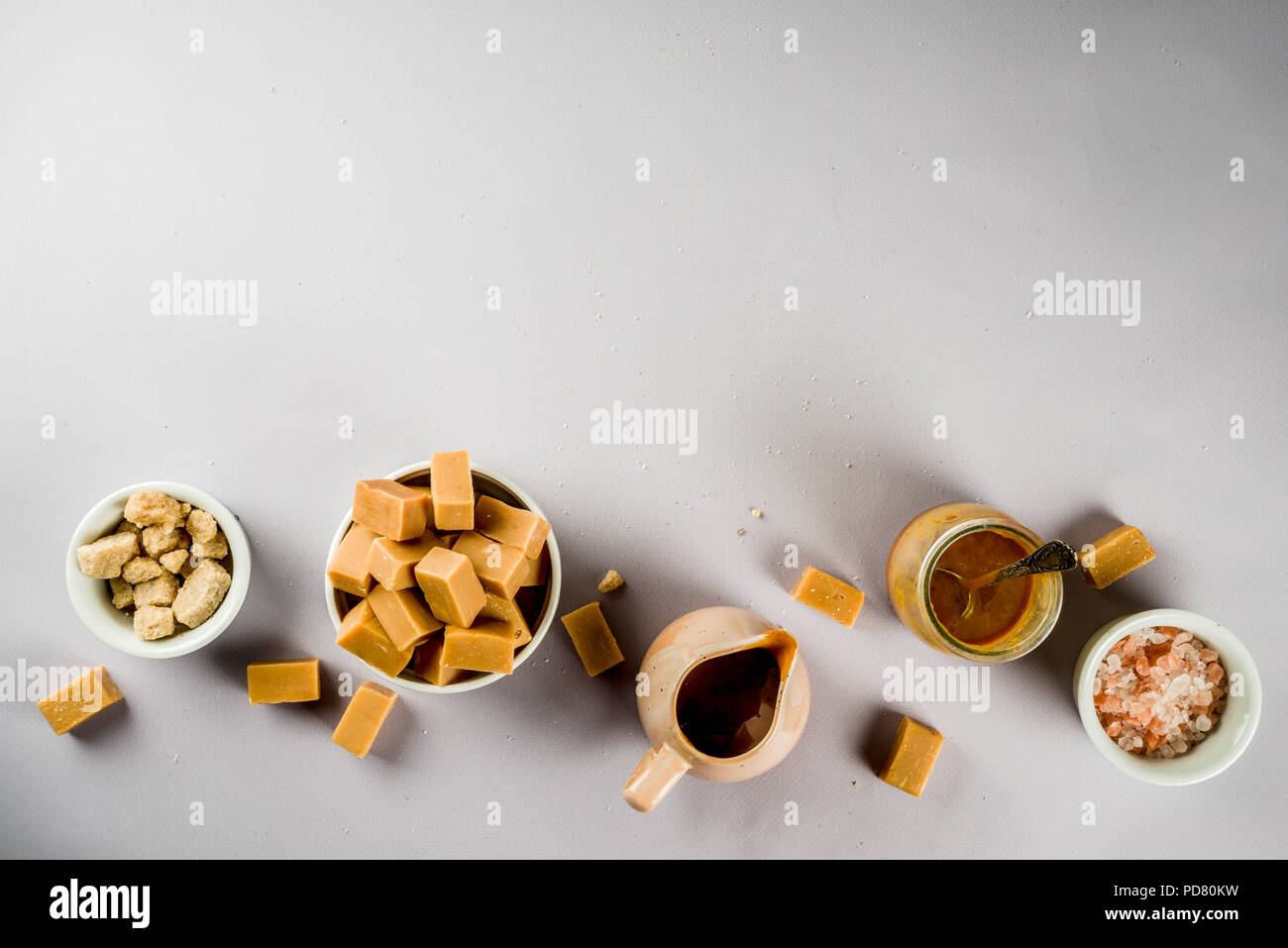Salted caramel sauce with fudge candy, fleur de sel, brown cane sugar