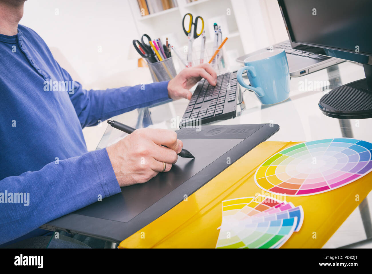 Designer using graphics tablet in the office Stock Photo