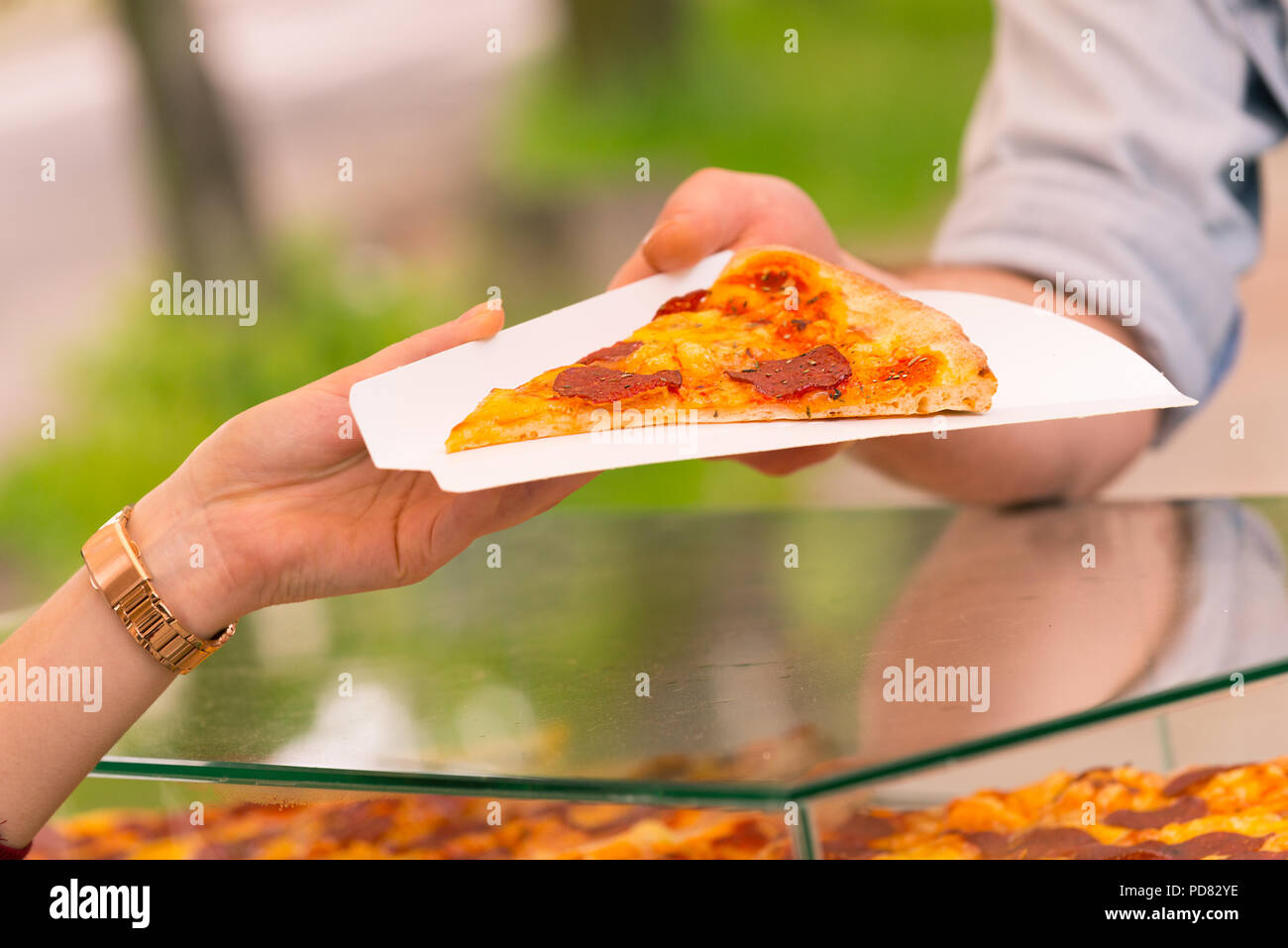 A street food vendor selling pizza by slice outdoors Stock Photo Alamy