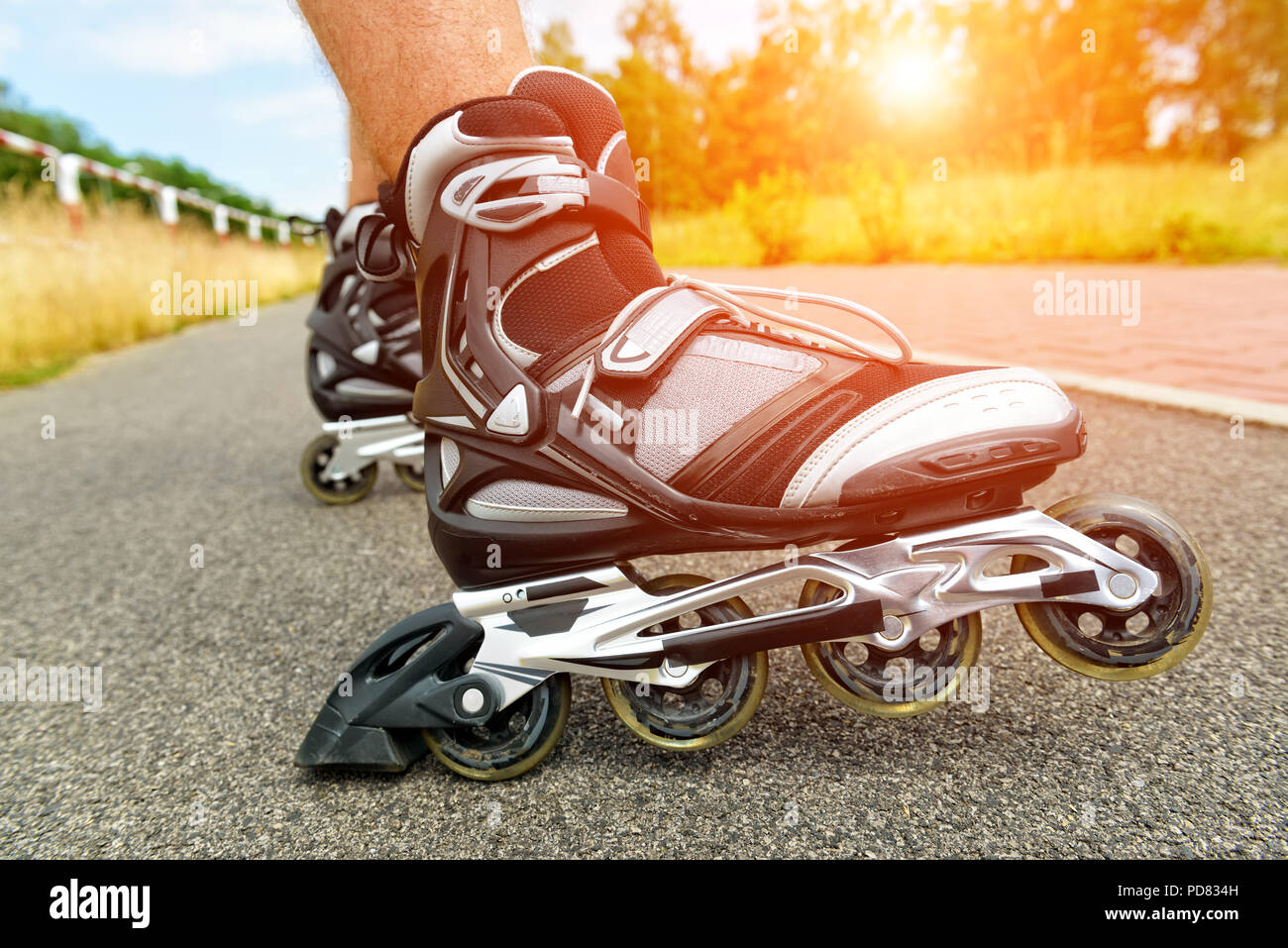 Roller blading outdoors, male legs Stock Photo Alamy