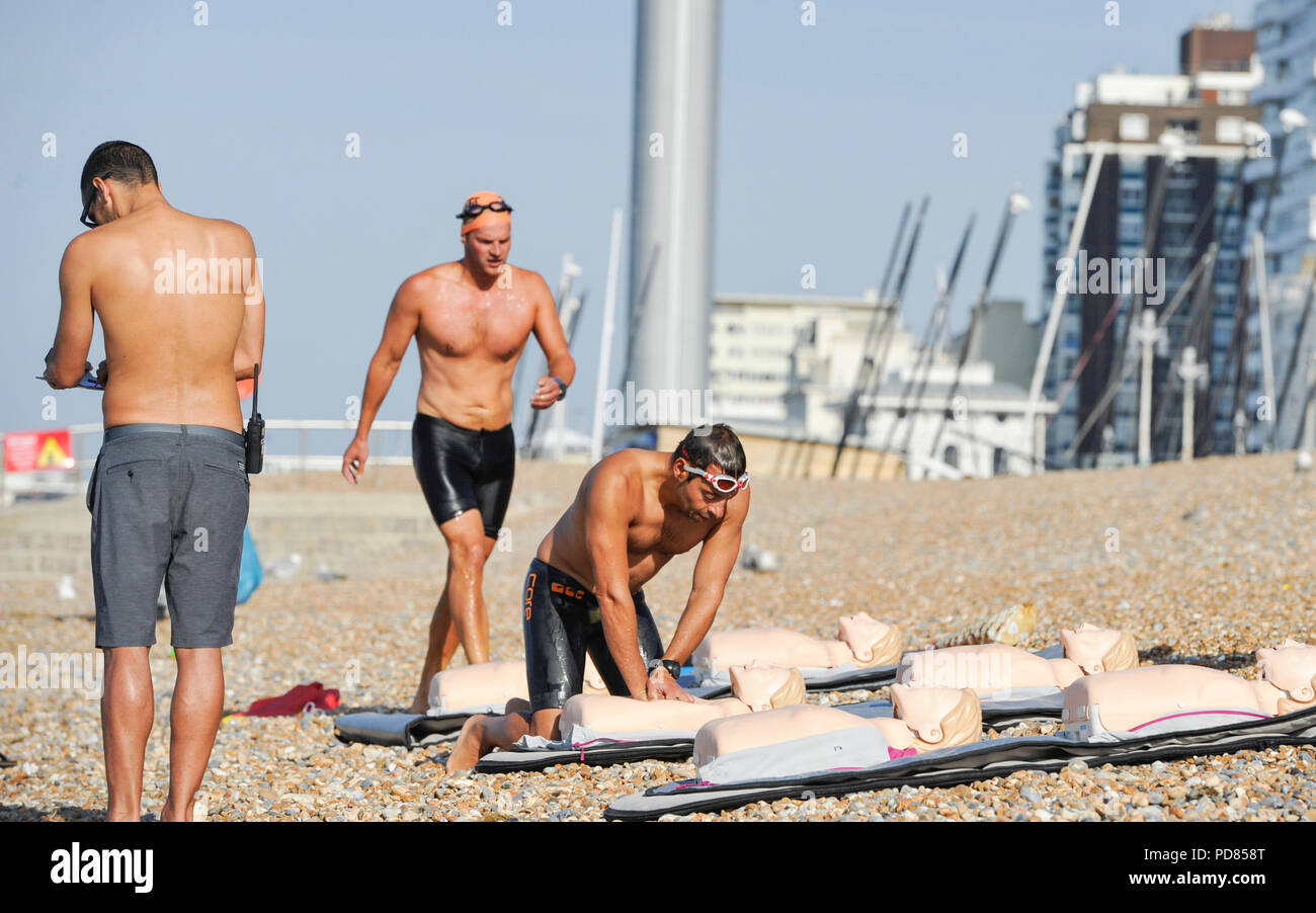 Brighton UK 7th August 2018 - Brighton Lifeguards go through their weekly training session as the hot sunny weather continues on the south coast but it is forecast to cool down throughout Britain over the next few days Credit: Simon Dack/Alamy Live News Stock Photo