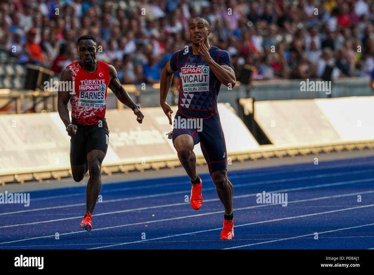 August 7, 2018: Jimmy Vicaut of Â France and Emre Zafer Barnes of Â Turkey during 100 meter mens semifinals at the Olympic Stadium in Berlin at the European Athletics Championship. Ulrik Pedersen/CSM Stock Photo