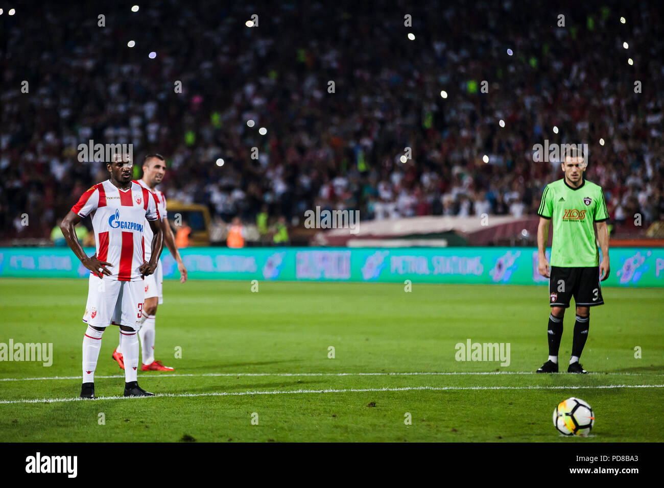 Belgrade, Serbia. 18th Sep, 2018. Crvena Zvezda's El Fardou Ben Nabouhane  (R) vies with Napoli's Raul Albiol during a UEFA Champions League group C  match between Crvena Zvezda and Napoli in Belgrade