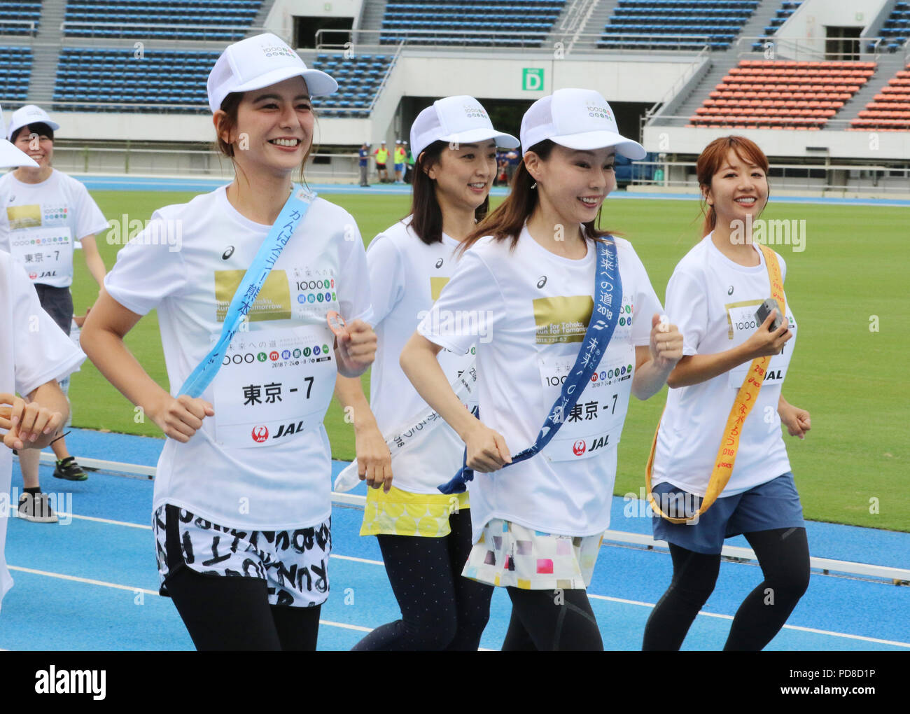 Tokyo, Japan. 7th Aug, 2018. (R-L) Japanese singer Dream Aya, marathon runner Masako Chiba, Barcelona Olympics swimming gold medalist Kyoko Iwasaki and TV personality Suzanne are on the way to finish line for the '1,000km relay to Tokyo' at the Komazawa stadium in Tokyo on Tuesday, August 7, 2018. Some 1,600 runners participated the marathon relay from Aomori to Tokyo for the commemoration of the 3.11 East Japan Great Earthquake. Credit: Yoshio Tsunoda/AFLO/Alamy Live News Stock Photo