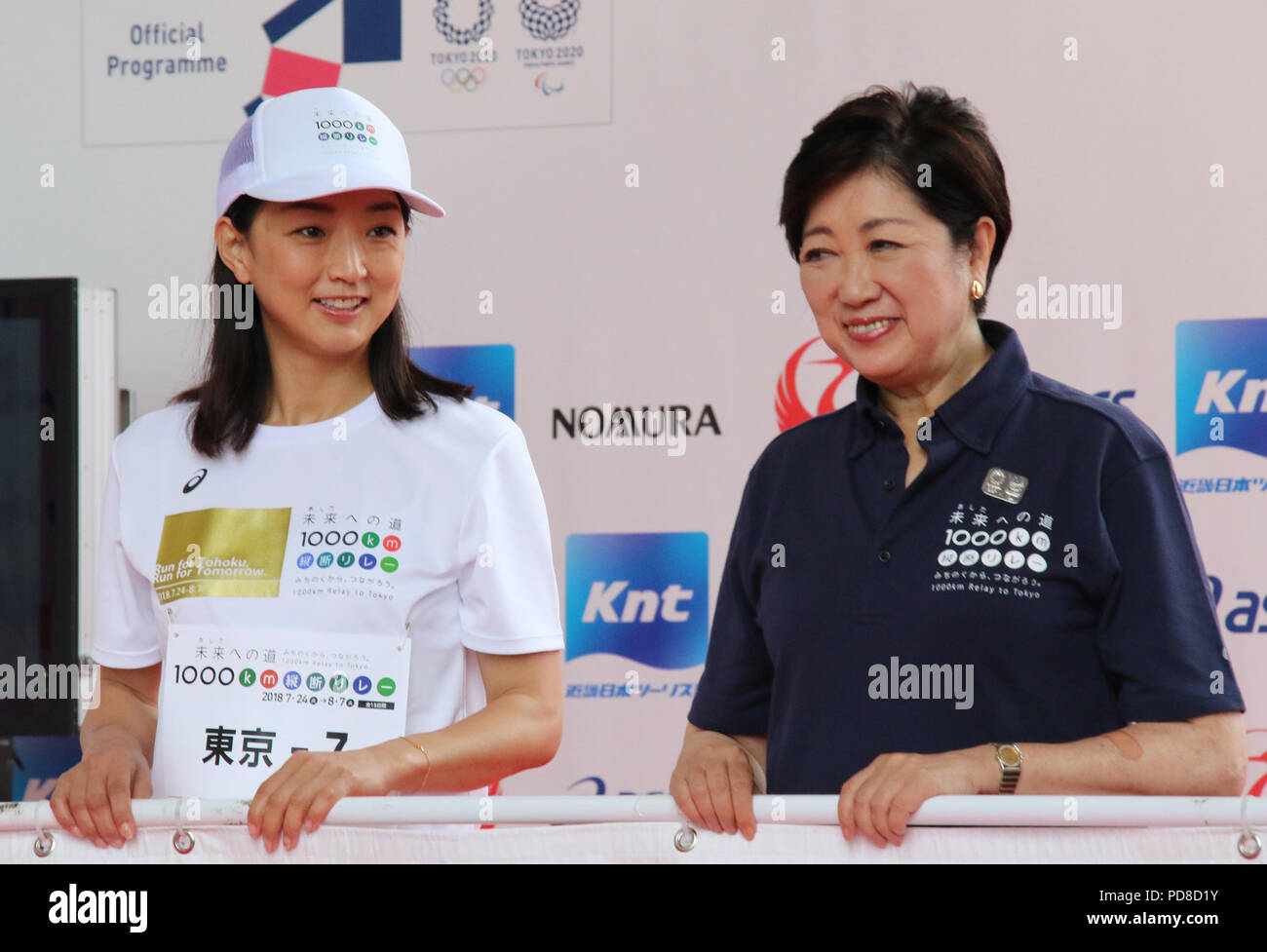 Tokyo, Japan. 7th Aug, 2018. Barcelona Olympics swimming gold medalist Kyoko Iwasaki (L) chats with after she finished the '1,000km relay to Tokyo' at the Komazawa stadium in Tokyo on Tuesday, August 7, 2018. Some 1,600 runners participated the marathon relay from Aomori to Tokyo for the commemoration of the 3.11 East Japan Great Earthquake. Credit: Yoshio Tsunoda/AFLO/Alamy Live News Stock Photo