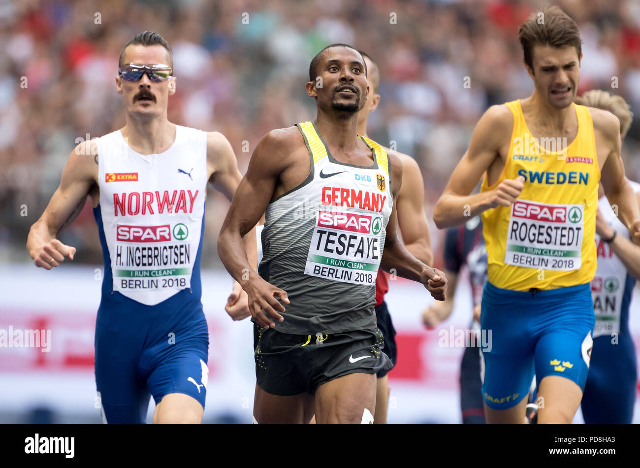 Berlin, Germany. 08th Aug, 2018. 08.08.2018, Berlin: Athletics: European Championships in the Olympic Stadium: 1500m, heat, Men: Henrik Ingebrigtsen (l-r) from Norway, Homiyu Tesfaye from Germany and Johan Rogestedt from Sweden in action. Credit: Sven Hoppe/dpa/Alamy Live News Stock Photo