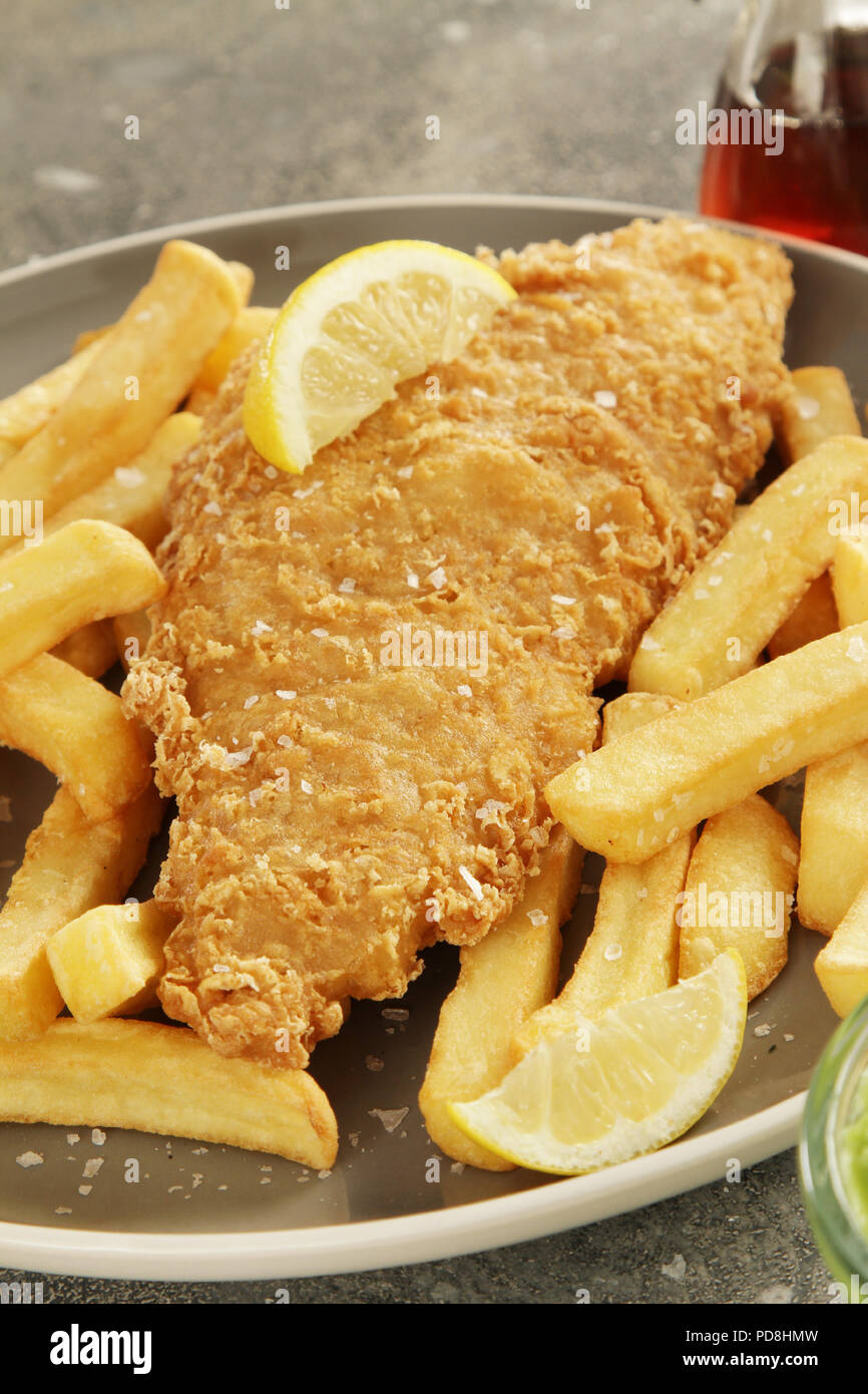 traditional british battered fish and chips Stock Photo Alamy