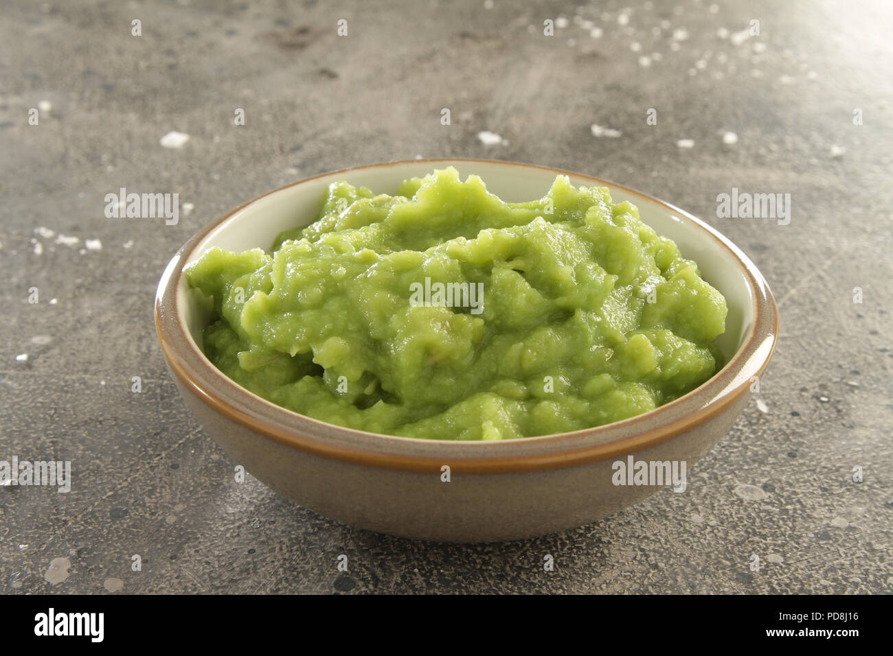 mushy peas in dish Stock Photo