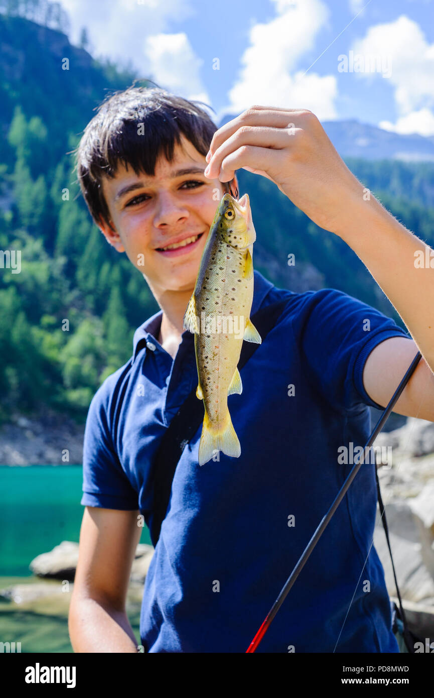 Teen male fishing hi-res stock photography and images - Alamy