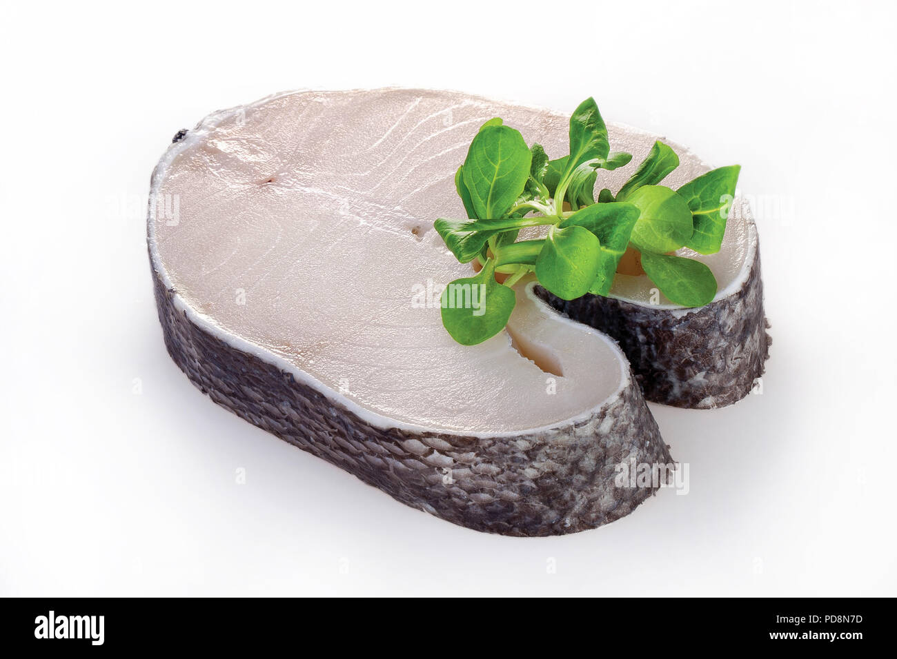 Raw steak of white fish salad on white background Stock Photo - Alamy
