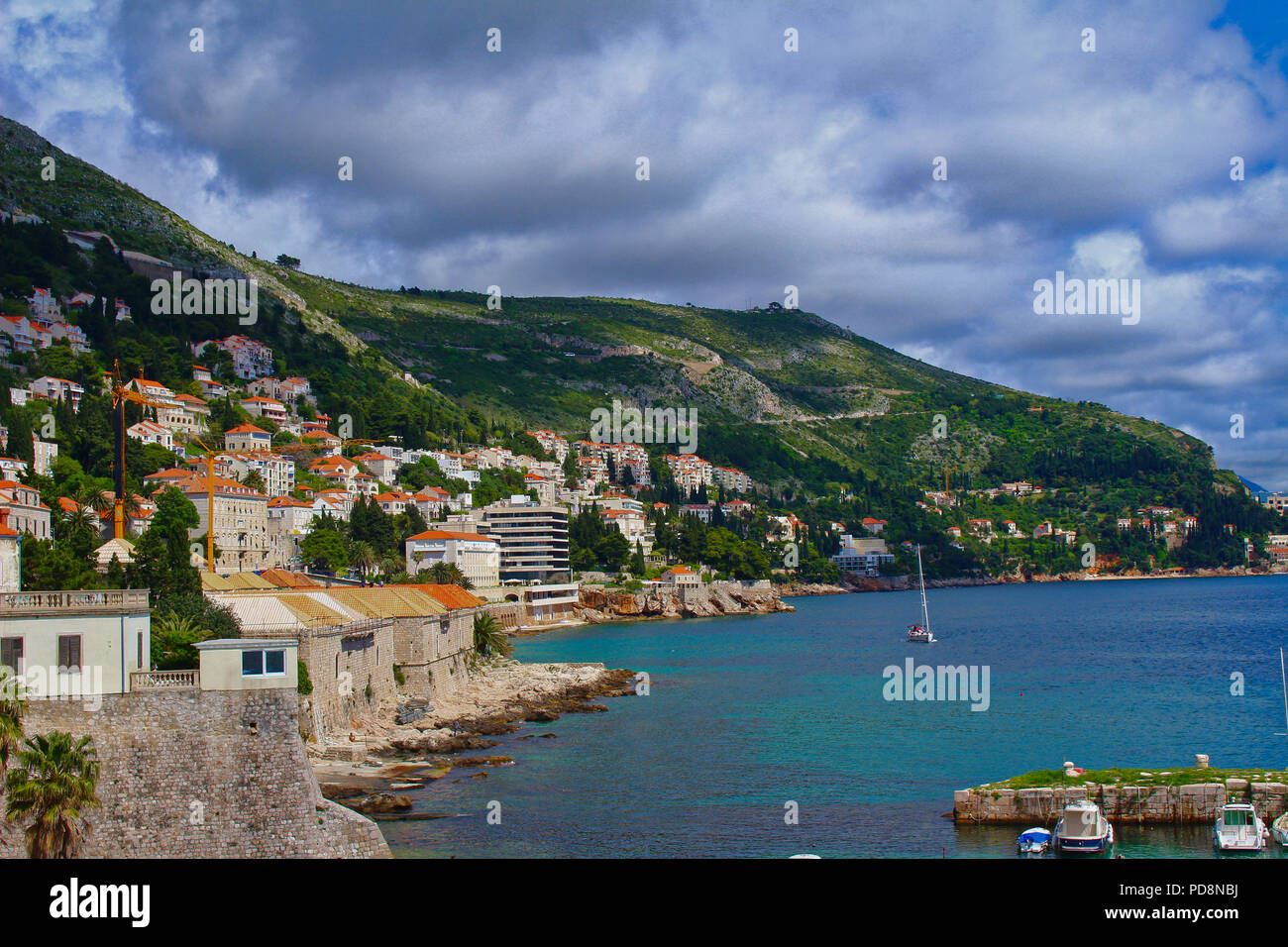 A view towards the harbor of the old town of Dubrovnik, Croatia and the Adriatic sea from the city walls Stock Photo