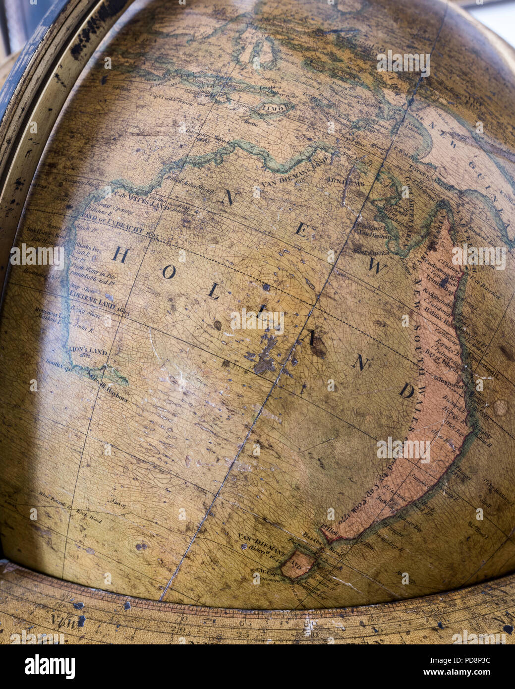 Large antique globe showing New Holland Stock Photo