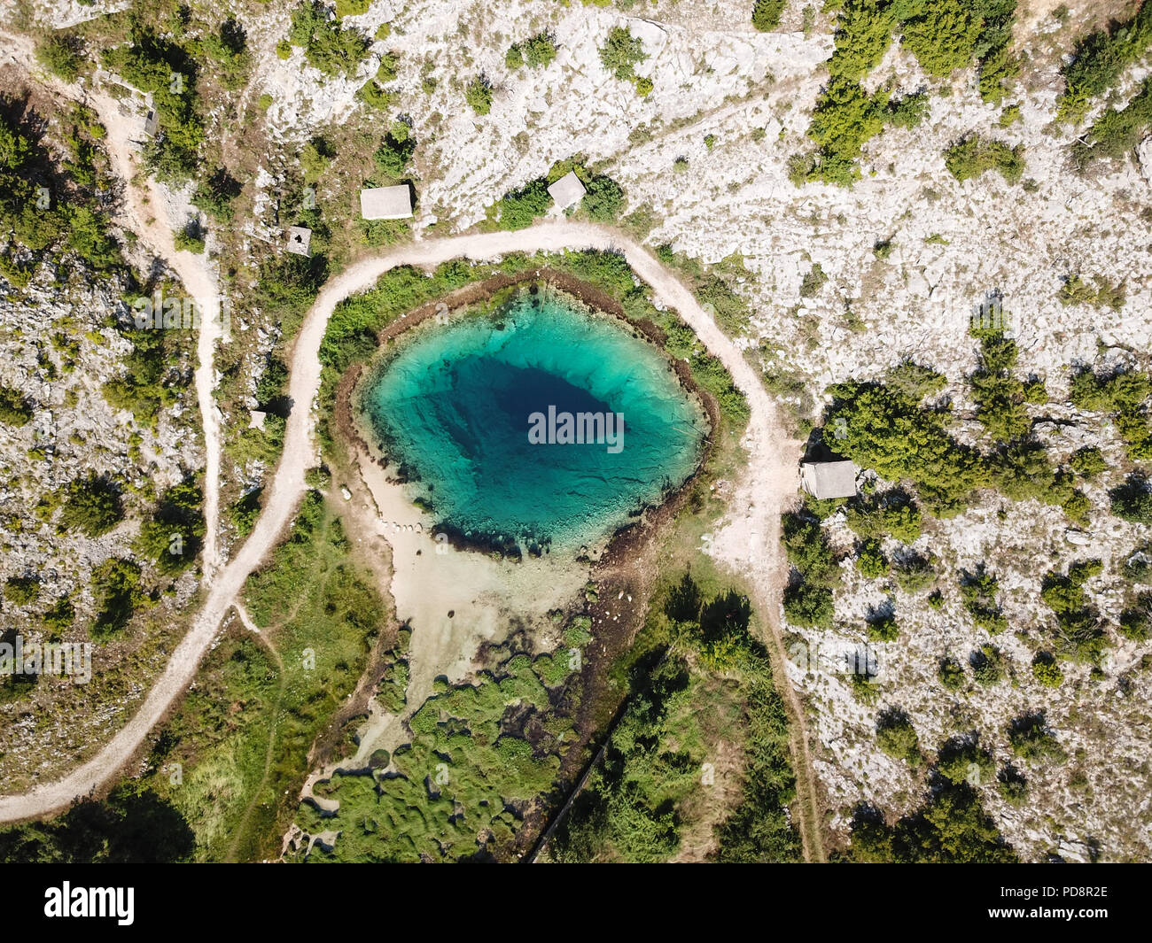 The spring of the Cetina River (izvor Cetine) in the foothills of the Dinara Mountain is named Blue Eye (Modro oko). Stock Photo