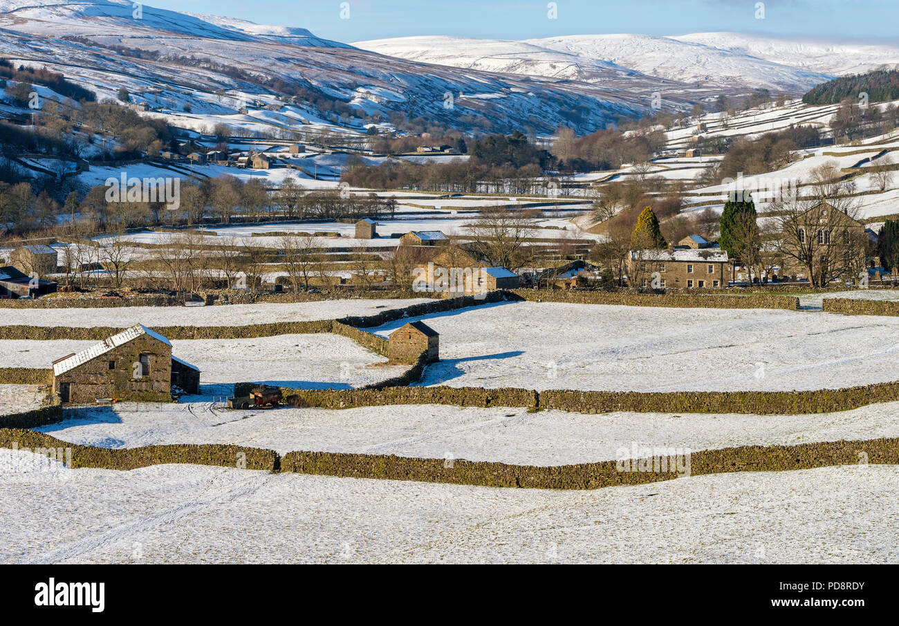 Barns in the snow at Gunnerside in Swaledale Stock Photo