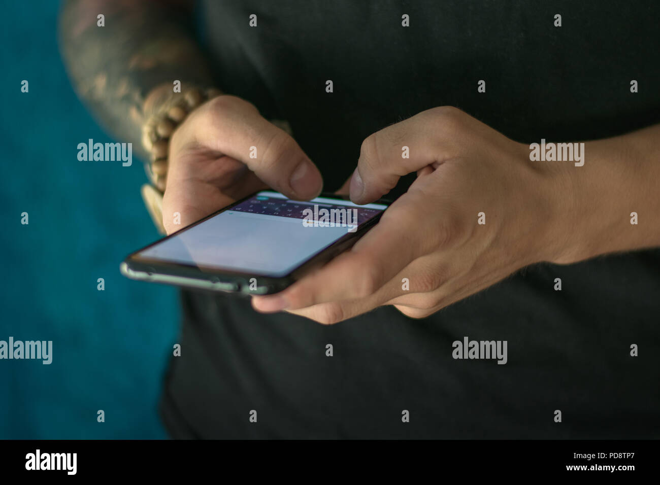 Holding phone in hands. Stock Photo