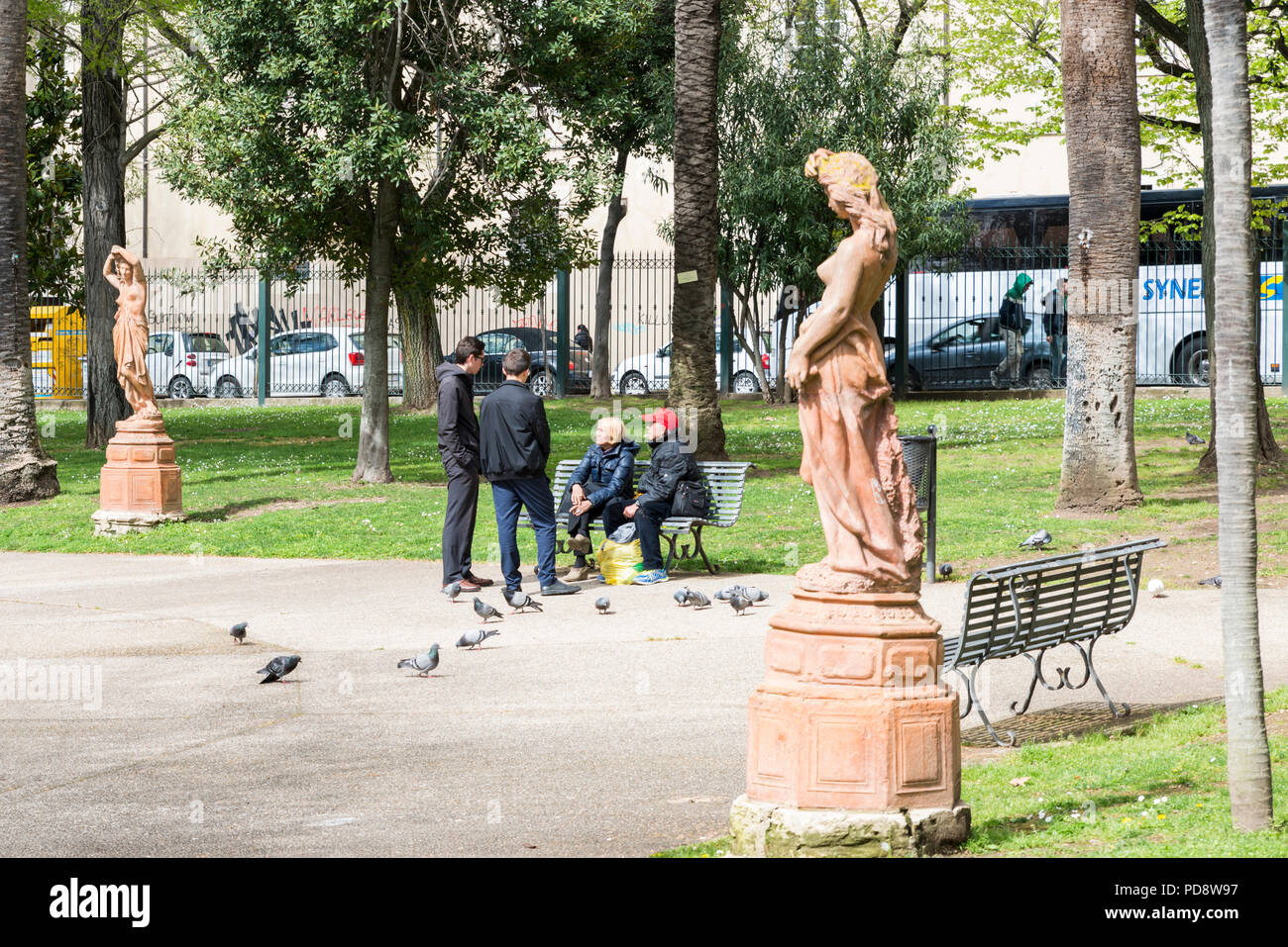 Sassari,Italy,12-april-2018:People relax in the village park of sassari on the italian island of sardinia or sardegna,sassari is one of the biggest citys in the west of sardinia island Stock Photo