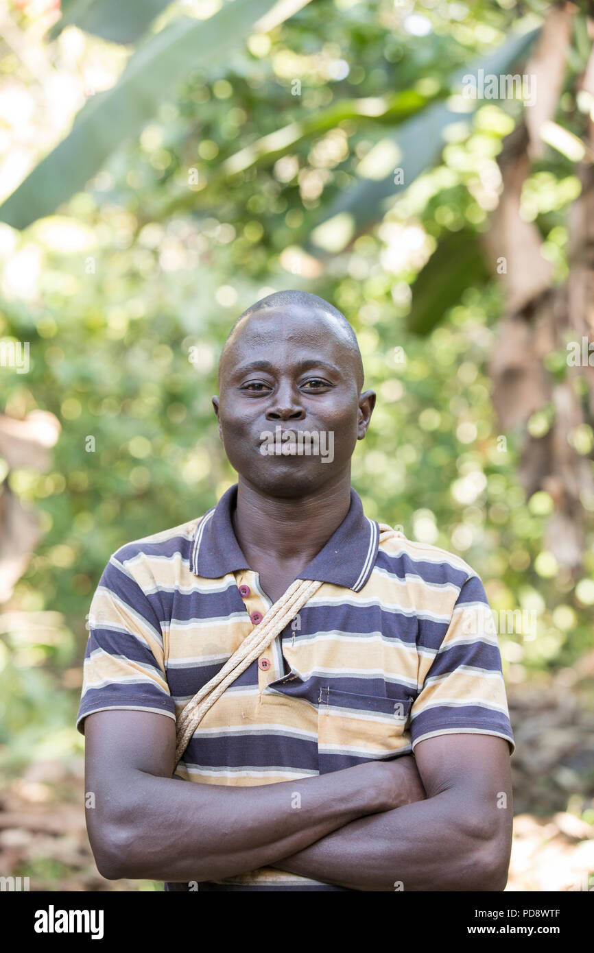 Portrait of a male cocoa farmer in Mukono District, Uganda. Stock Photo