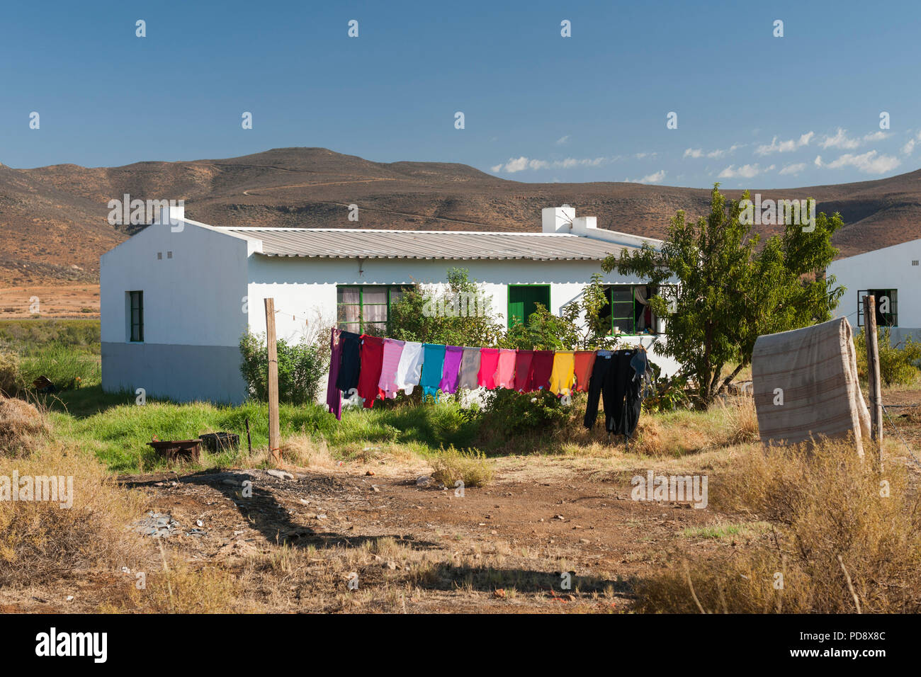 Washing drying outside a house in the Biedouw Valley in the Cederberg Mountains in South Africa. Stock Photo