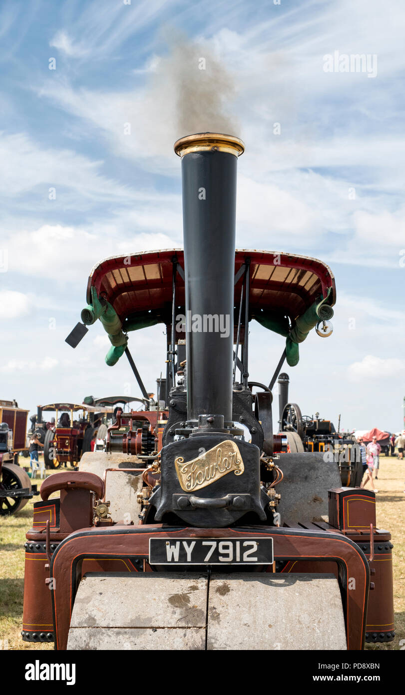 1923 Fowler Traction engine and a showmans caravan at a steam fair in England Stock Photo
