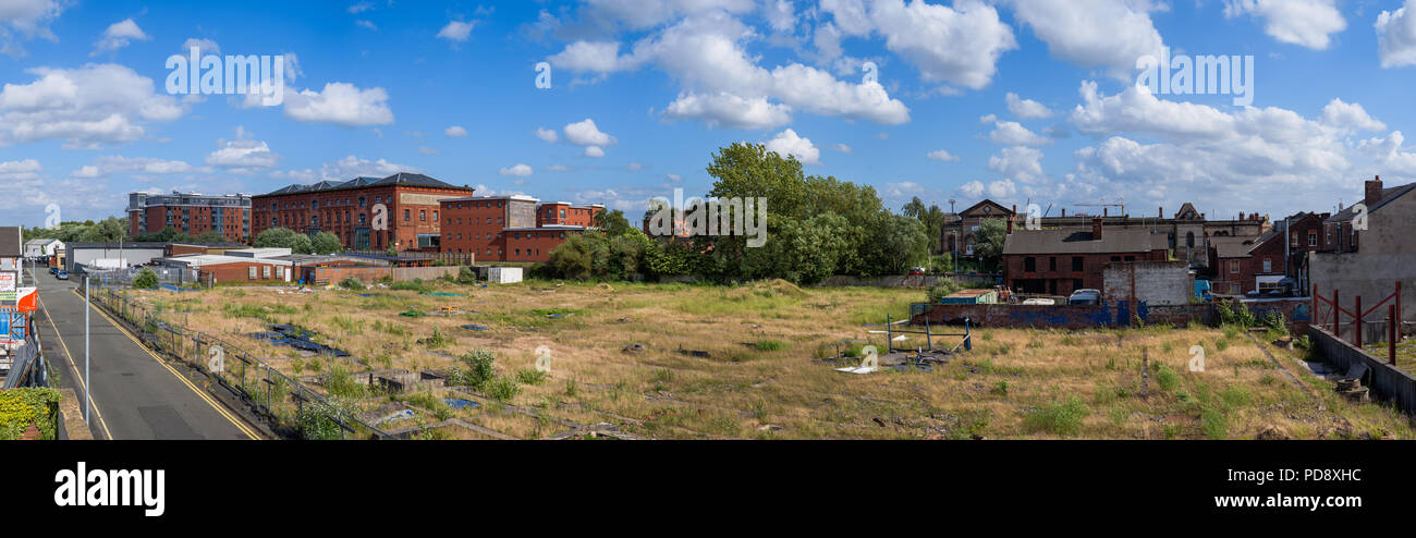 Cheshire Lines Committee Warehouse, Warrington, Cheshire. surrounded by wasteland. A Grade 2 listed building which has been converted into apartments. Stock Photo