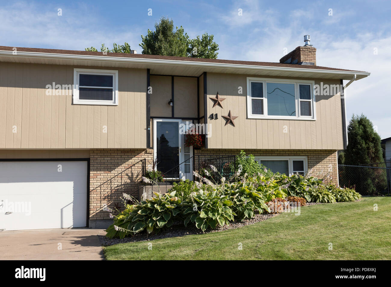 Residential House Exterior in Middle Class Neighborhood, MT, USA Stock