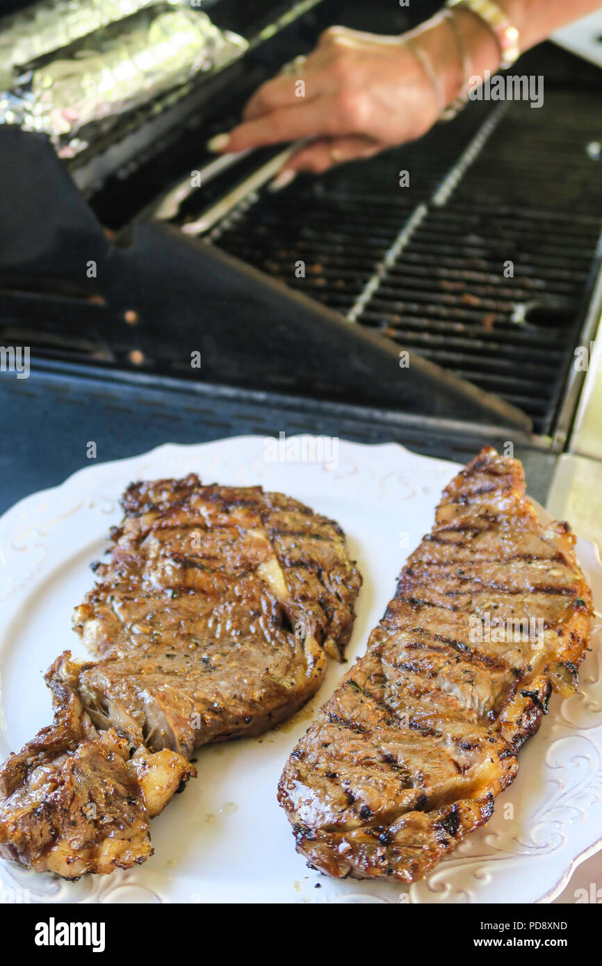 Grilling Steaks On The Patio Deck Usa Stock Photo 214711545 Alamy