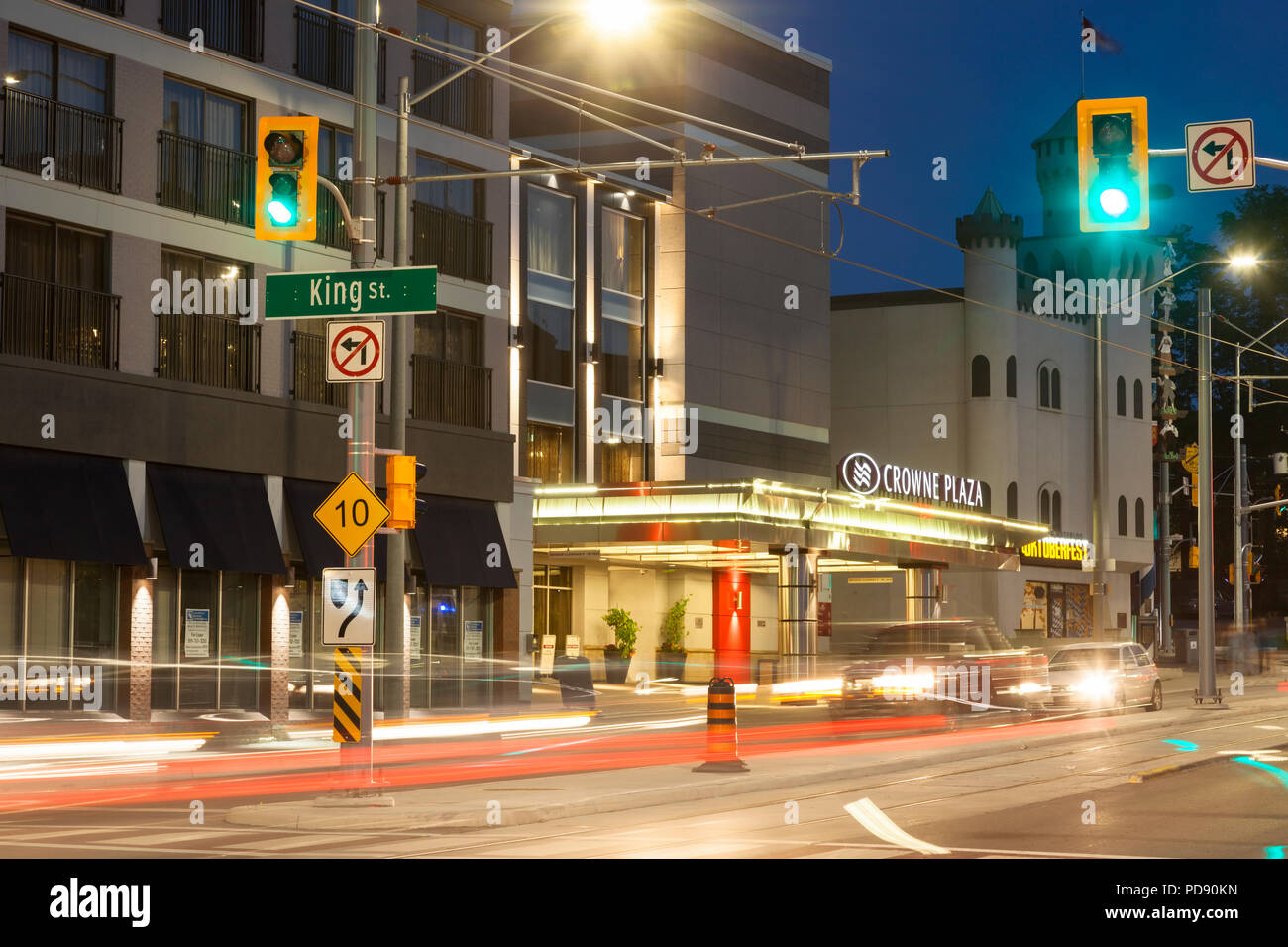 The Crowne Plaza Hotel along Benton Street at dusk in downtown Kitchener, Ontario, Canada. Stock Photo