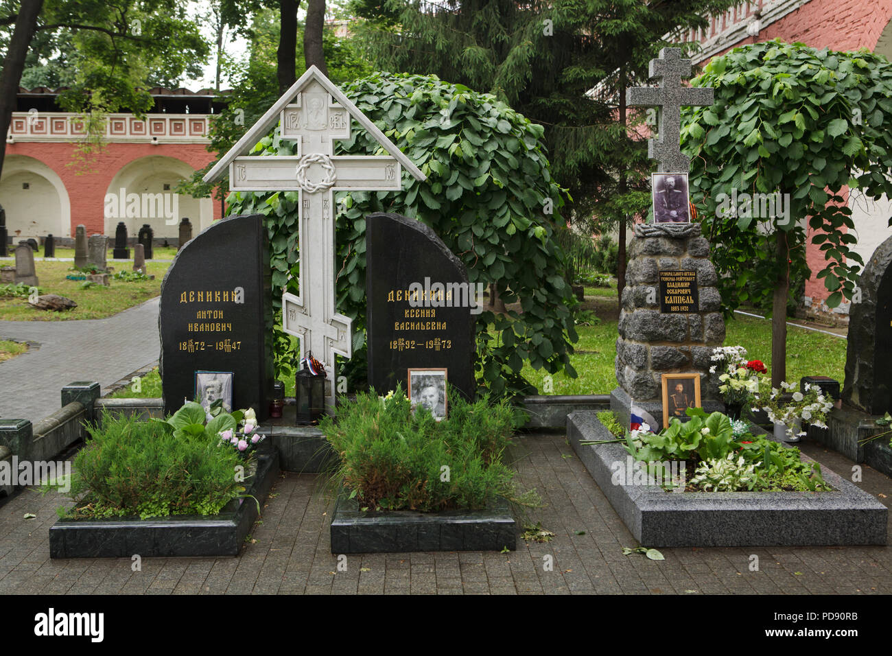 Graves of Russian military leader Anton Denikin and his wife Xenia Denikina, Russian military leader Vladimir Kappel (pictured from left to right) at the cemetery of the Donskoy Monastery in Moscow, Russia. The remains of the leading figures of the White movement during the Russian Civil War were transferred to Moscow from the United States, France and China in 2005 and 2006. Stock Photo