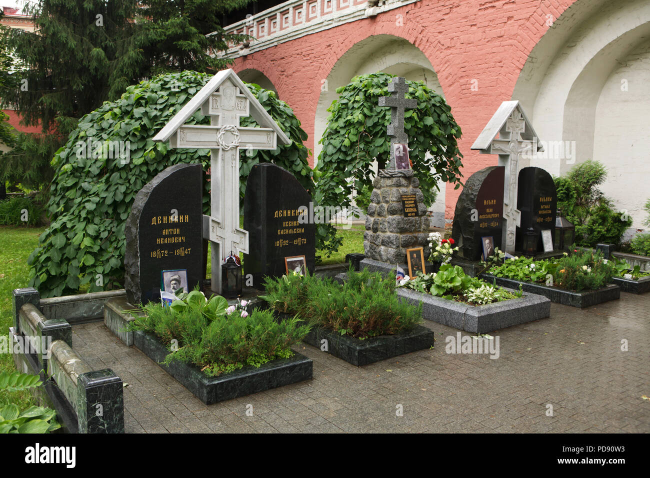 Graves of Russian military leader Anton Denikin and his wife Xenia Denikina, Russian military leader Vladimir Kappel and Russian philosopher Ivan Ilyin and his wife Natalia Ilyina (pictured from left to right) at the cemetery of the Donskoy Monastery in Moscow, Russia. The remains of the leading figures of the White movement during the Russian Civil War and of the Russian white émigré were transferred to Moscow from the United States, France, China and Switzerland in 2005 and 2006. Stock Photo