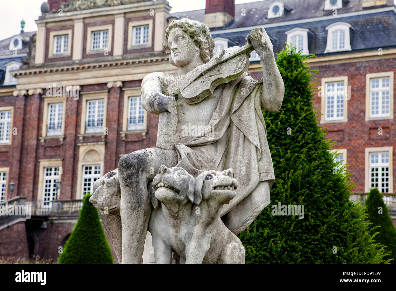 A baroque violinist, sculpture at Nordkirchen Moated Palace, Germany Stock Photo