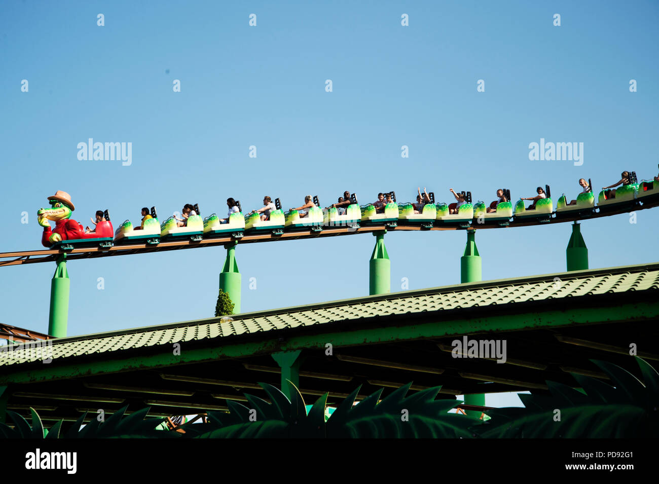 Southend on Sea, Essex. Adventure Island fun fair. Visitors enjoy an aerial ride Stock Photo