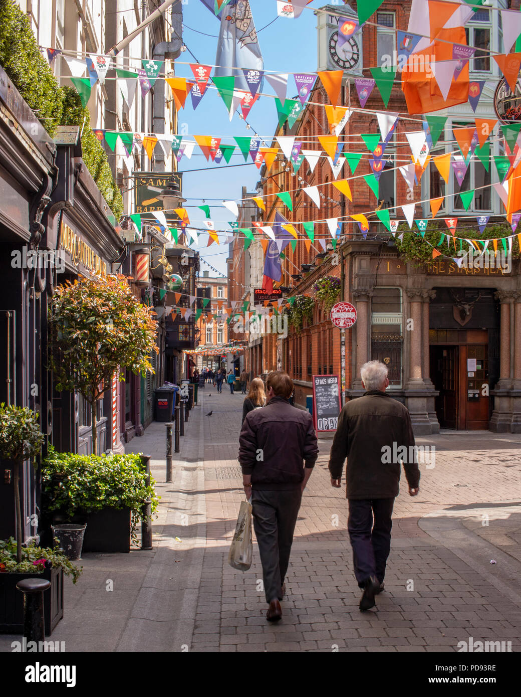 People walking on Dame Lane, Dublin on a summers day. Stock Photo