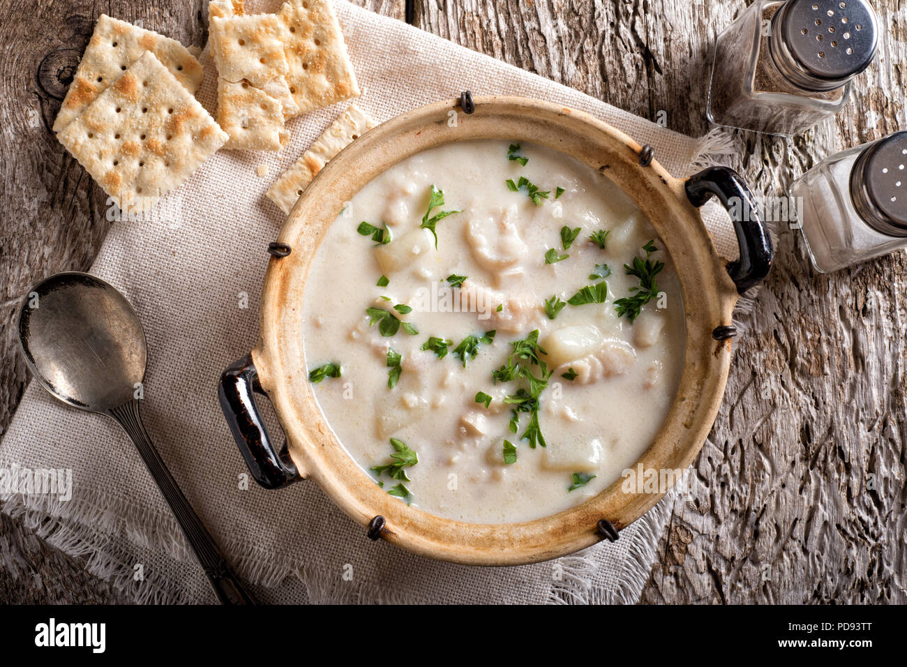 A delicious creamy white fish chowder with haddock, cod, potato, and onion garnished with