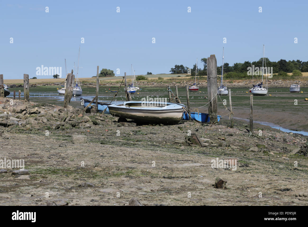 Old boat moored up at lowtide Stock Photo - Alamy