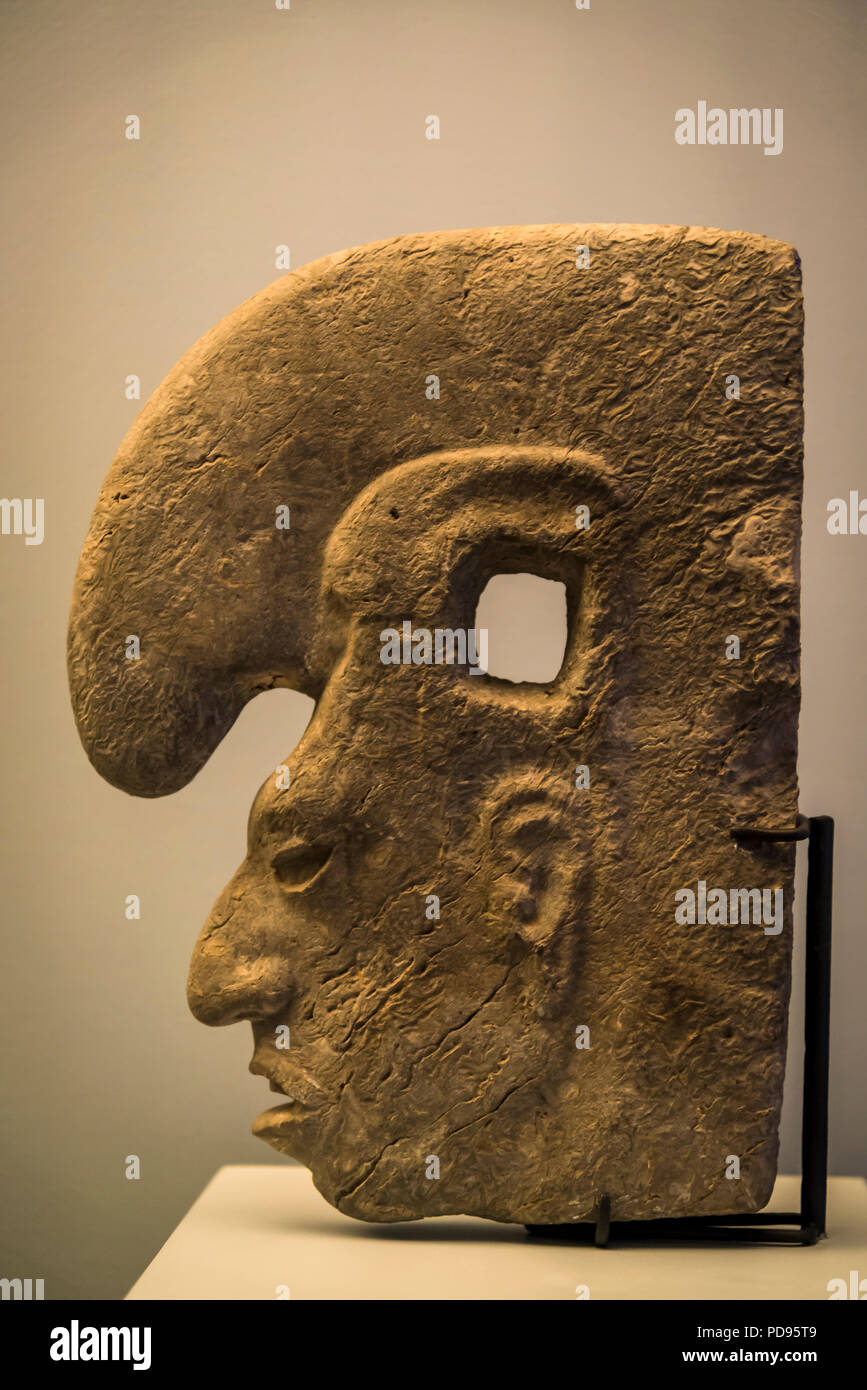 Axe, votive sculpture with human head, Culture de El Tajin,, Amparo