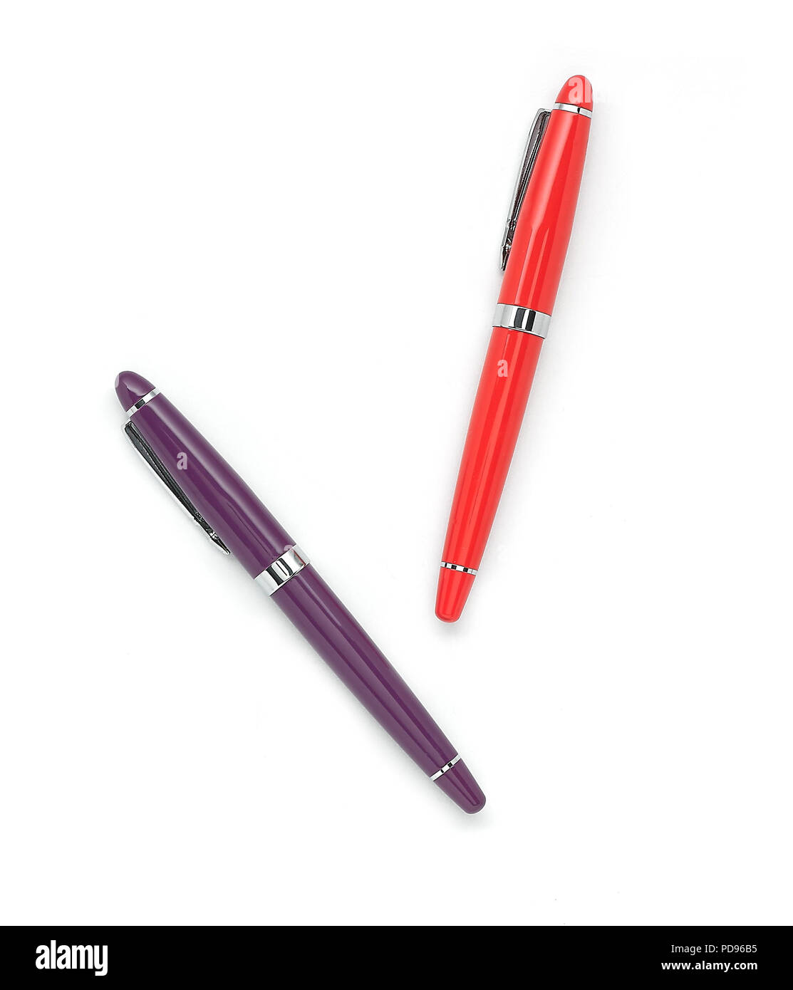 Orange and purple writing pens Stock Photo