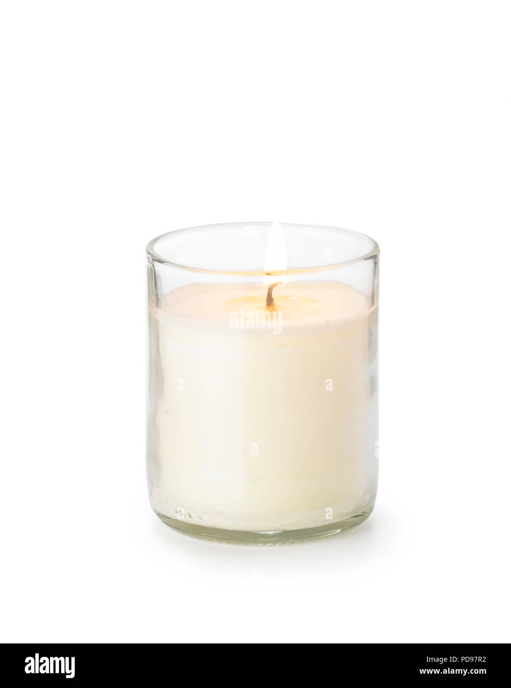 White candle with flame Stock Photo