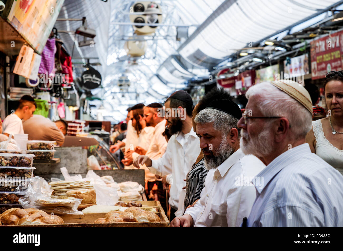 Jewish hoppers at the Mahane Yehuda market in central Jerusalem, Israel