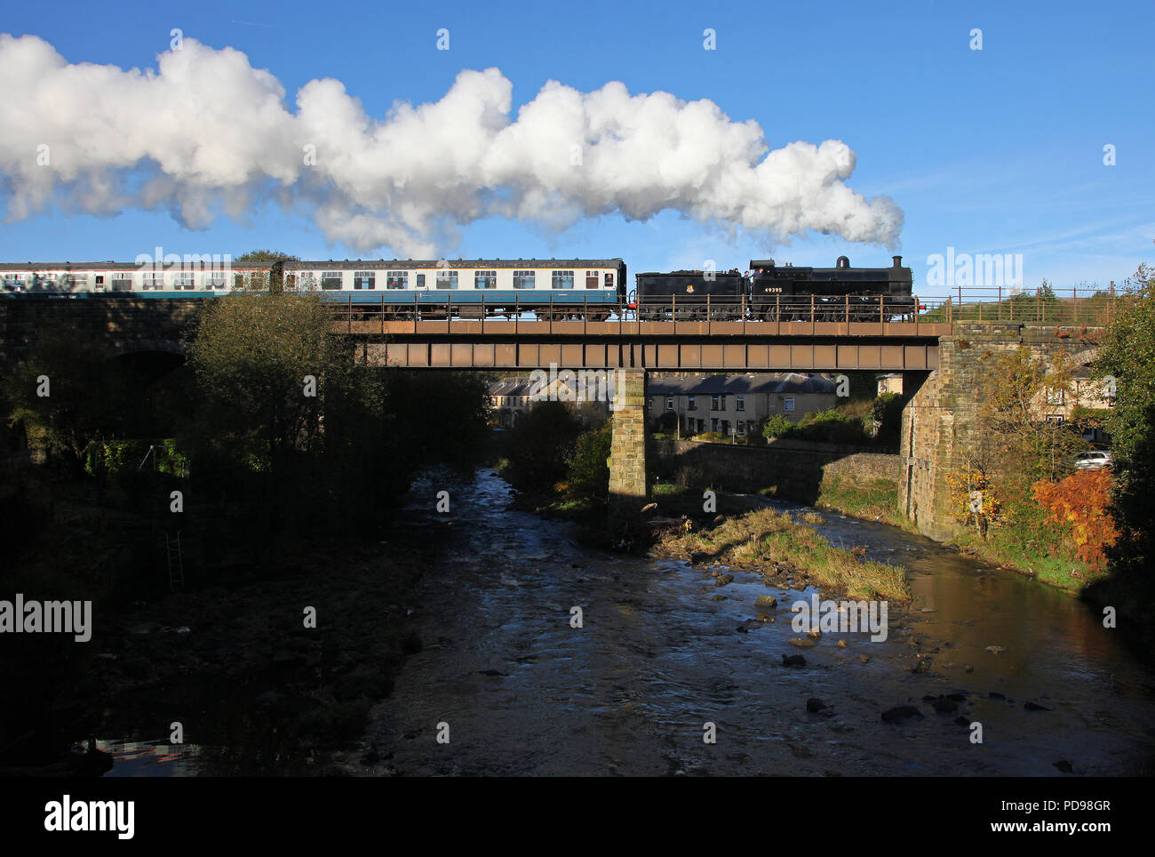 Super D 49395 heads over Brooksbottom Viaduct on the East Lancs Railway. Stock Photo