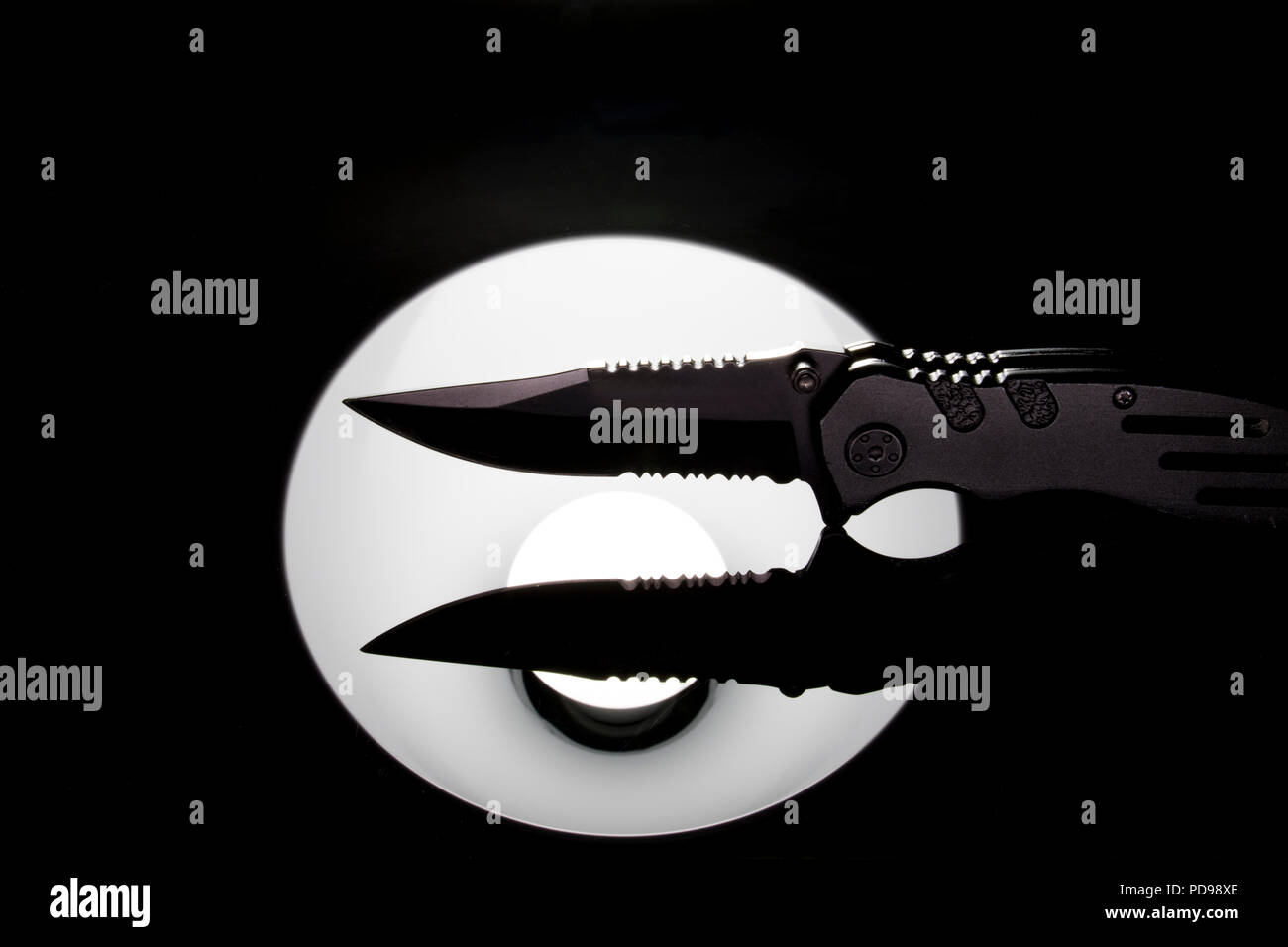 Black knife with black blade Stock Photo Alamy