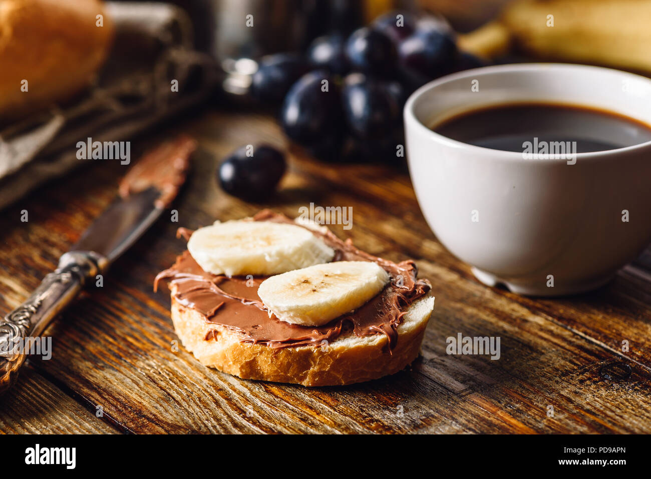 Breakfast with Banana Sandwich with Chocolate Spread, Coffee Cup and