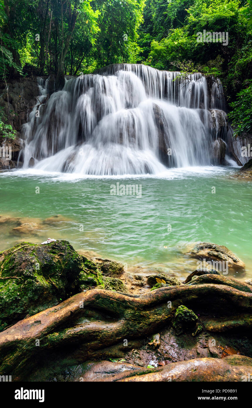 Beautiful waterfall in tropical rainforest at Kanchanaburi province, Thailand Stock Photo
