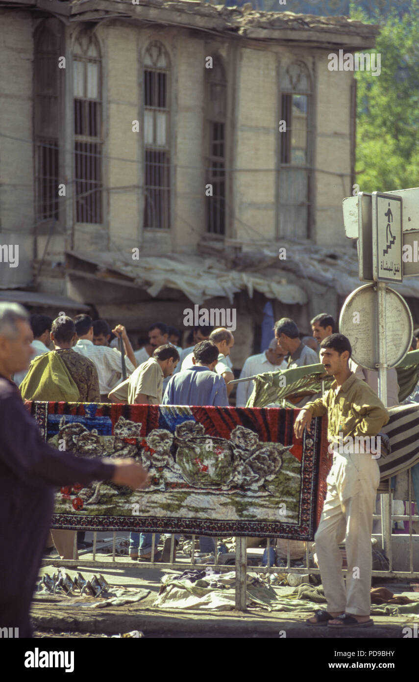 Baghdad, Iraq - October 1995 - Iraqi's of all classes go to the second hand public markets to find items and spare parts not found elsewhere due to the strict UN sanctions imposed during the 1990s because of Iraq's invasion of Kuwait in 1990. Stock Photo