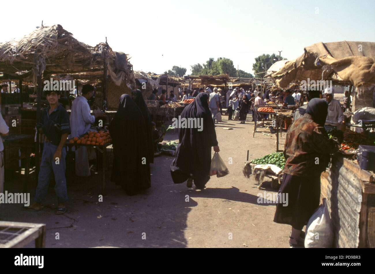 Baghdad, Iraq - October 1995 - A fruit and vegetable market in central Baghdad.  Iraqi's struggling due to the strict UN sanctions imposed during the 1990s because of Iraq's invasion of Kuwait in 1990. Stock Photo