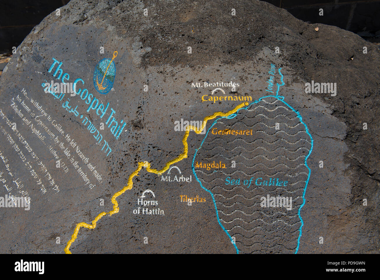 Sea of Galilee, israel  May 18  2018: Map of the Gospel trail carved and painted on a rock near the Sea of Galilee. translation on the map. Stock Photo