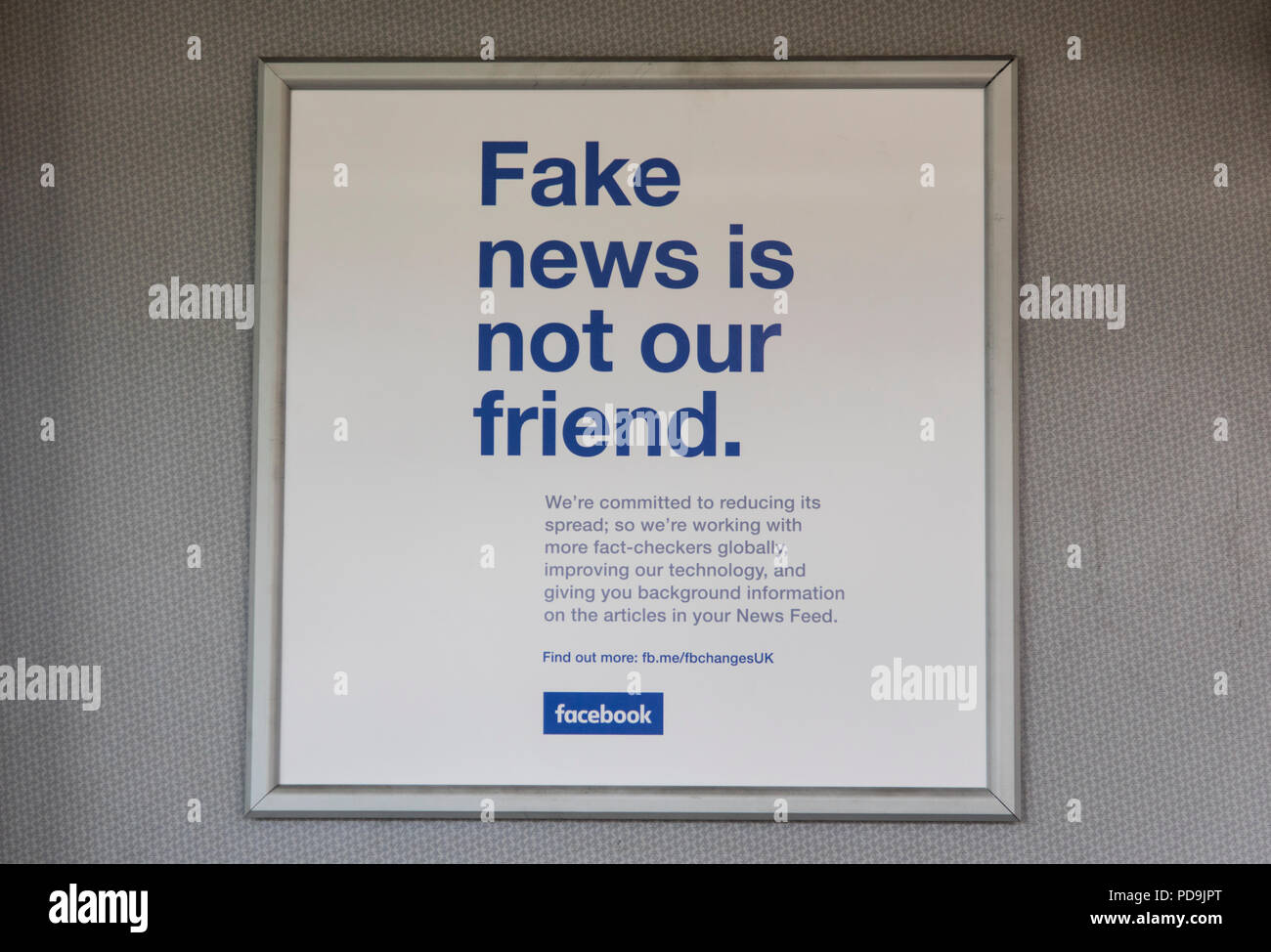 LONDON, UK - AUGUST 7th 2018: Facebook fake news advert. Facebook announcement to reduce fake news stories on the social media website Stock Photo